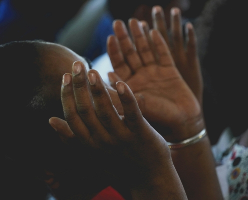 Women worshiping God.
