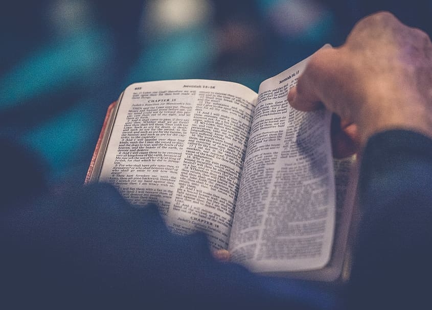 Man reading bible.